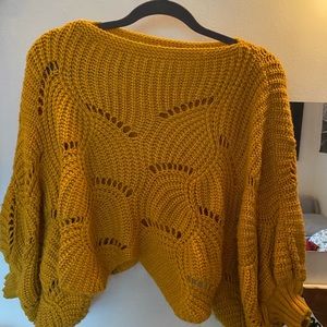 knit yellow sweater